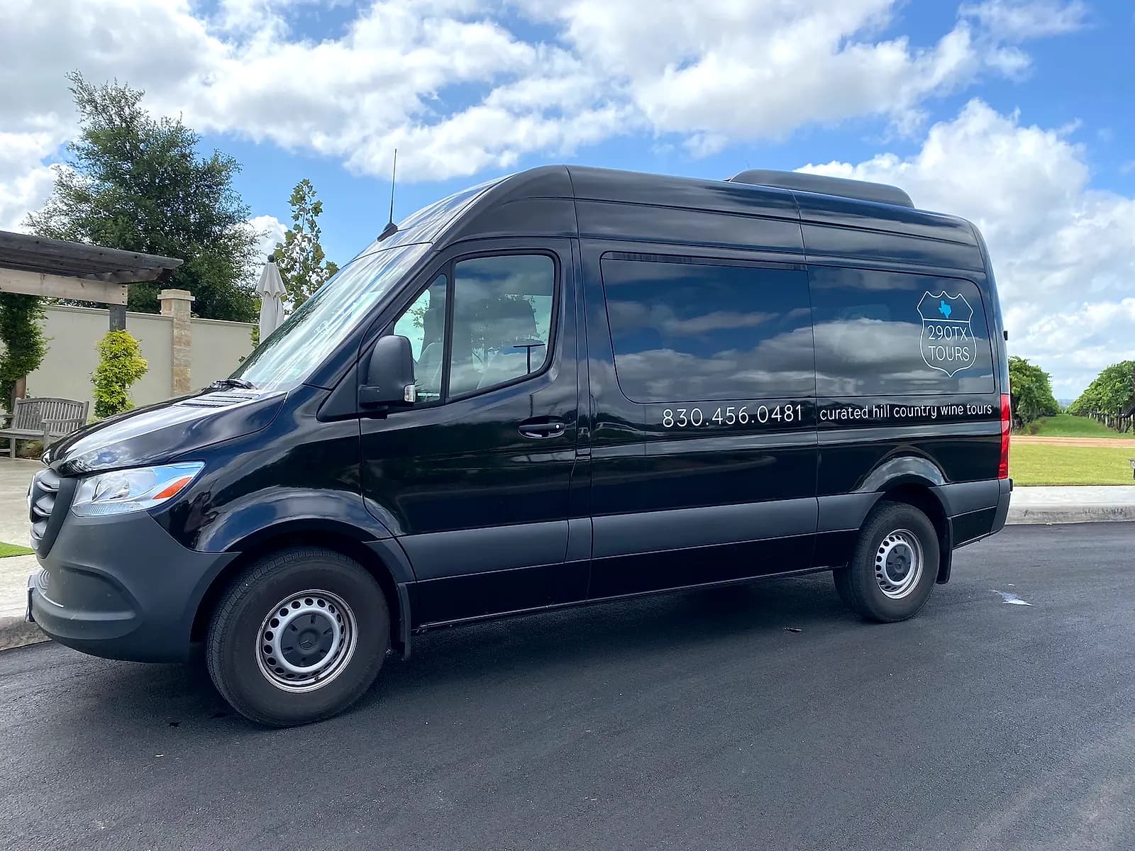 Mercedes-Benz Sprinter waiting at a Fredericksburg property entrance